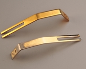 Vintage Guild pickguard brackets prior to restoration.